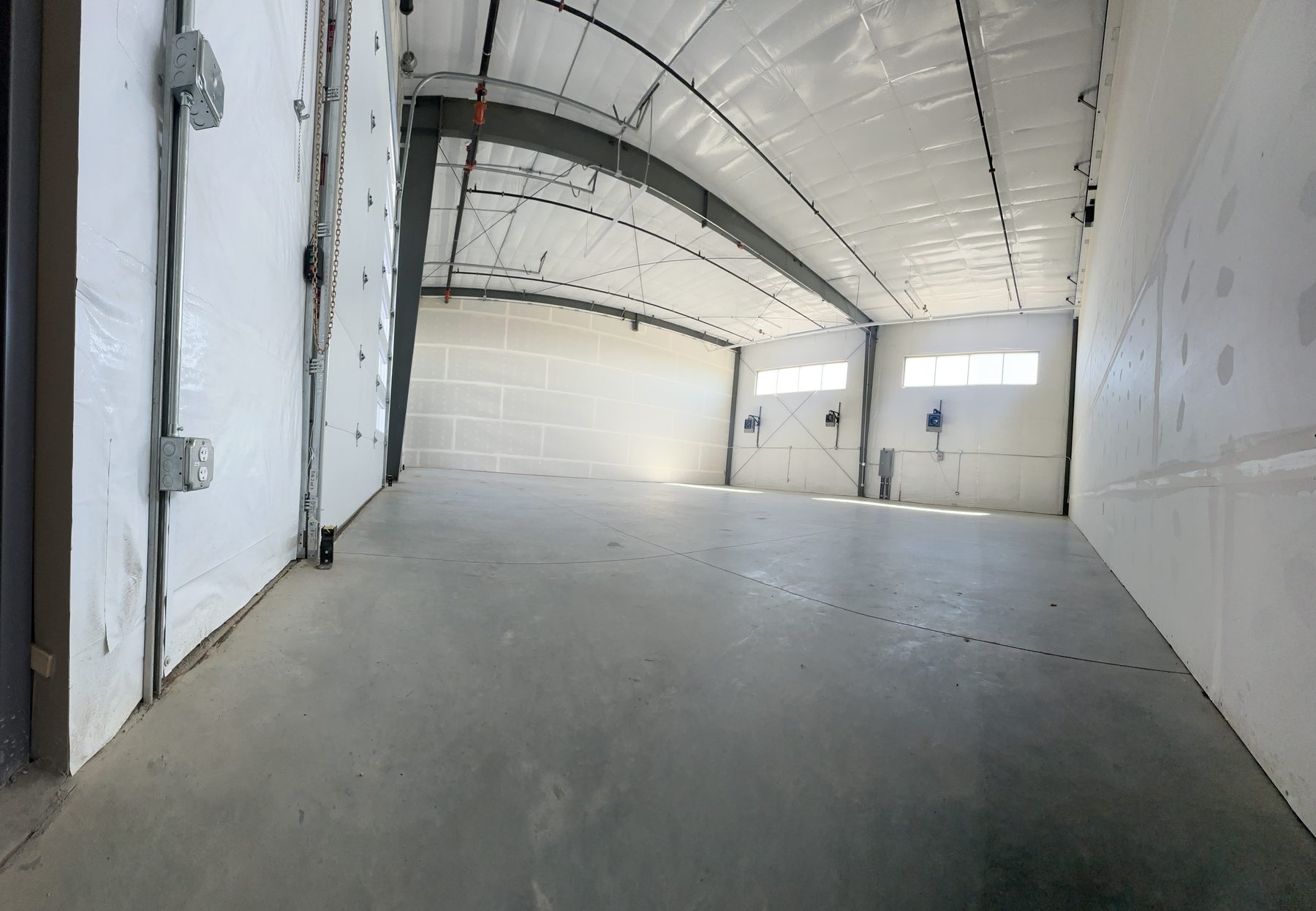 Block A Unit 4 interior with drive-in door